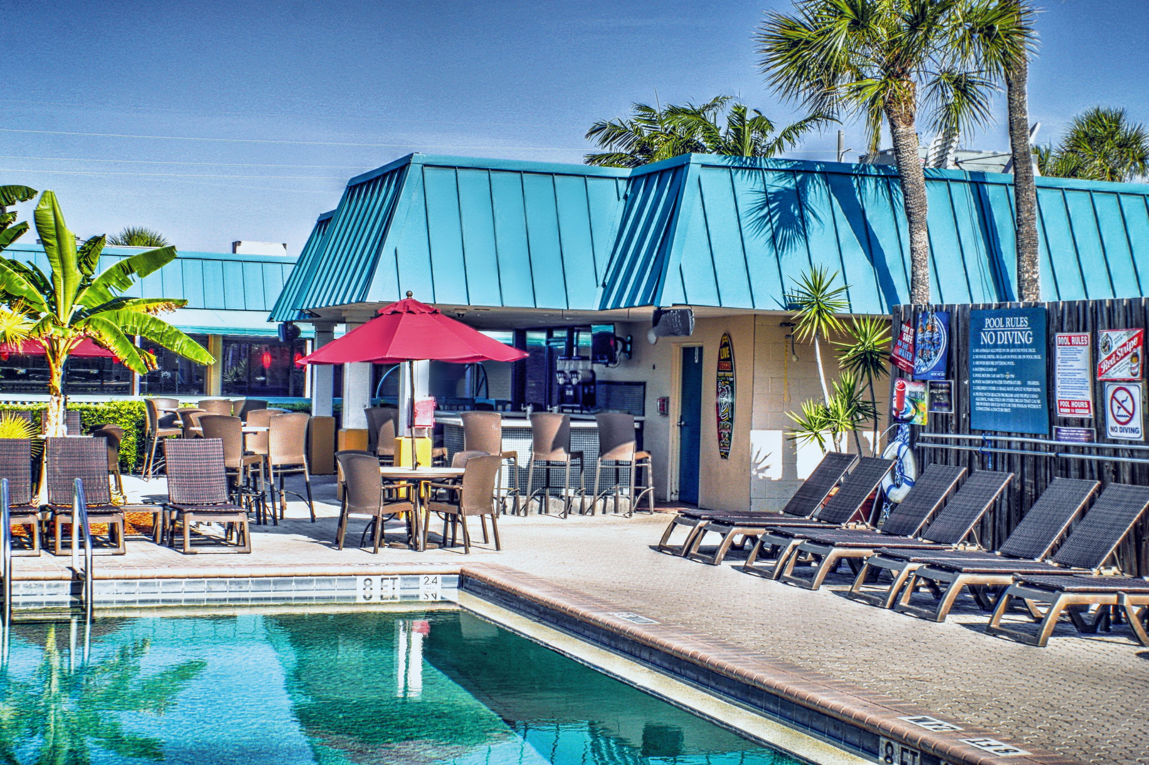Outdoor pool, a heated pool, pool umbrellas