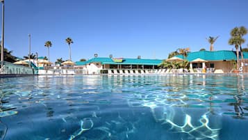 Outdoor pool, a heated pool, pool umbrellas