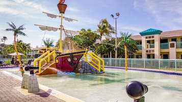 Outdoor pool, a heated pool, pool umbrellas