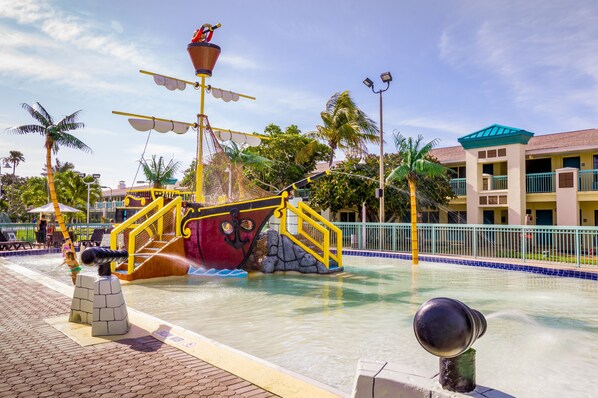 Outdoor pool, a heated pool, pool umbrellas