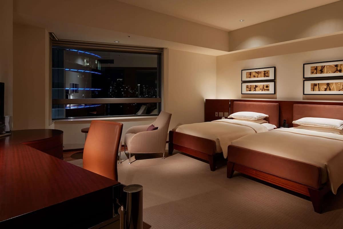 Frette Italian sheets, premium bedding, down comforters, minibar