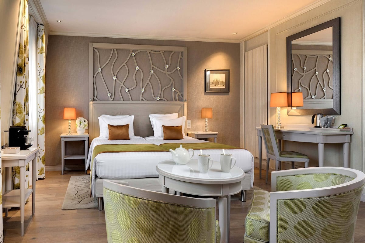 Deluxe Room | Premium bedding, in-room safe, desk, blackout drapes