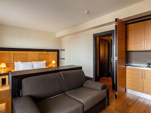 Junior Suite | 1 bedroom, premium bedding, minibar, in-room safe