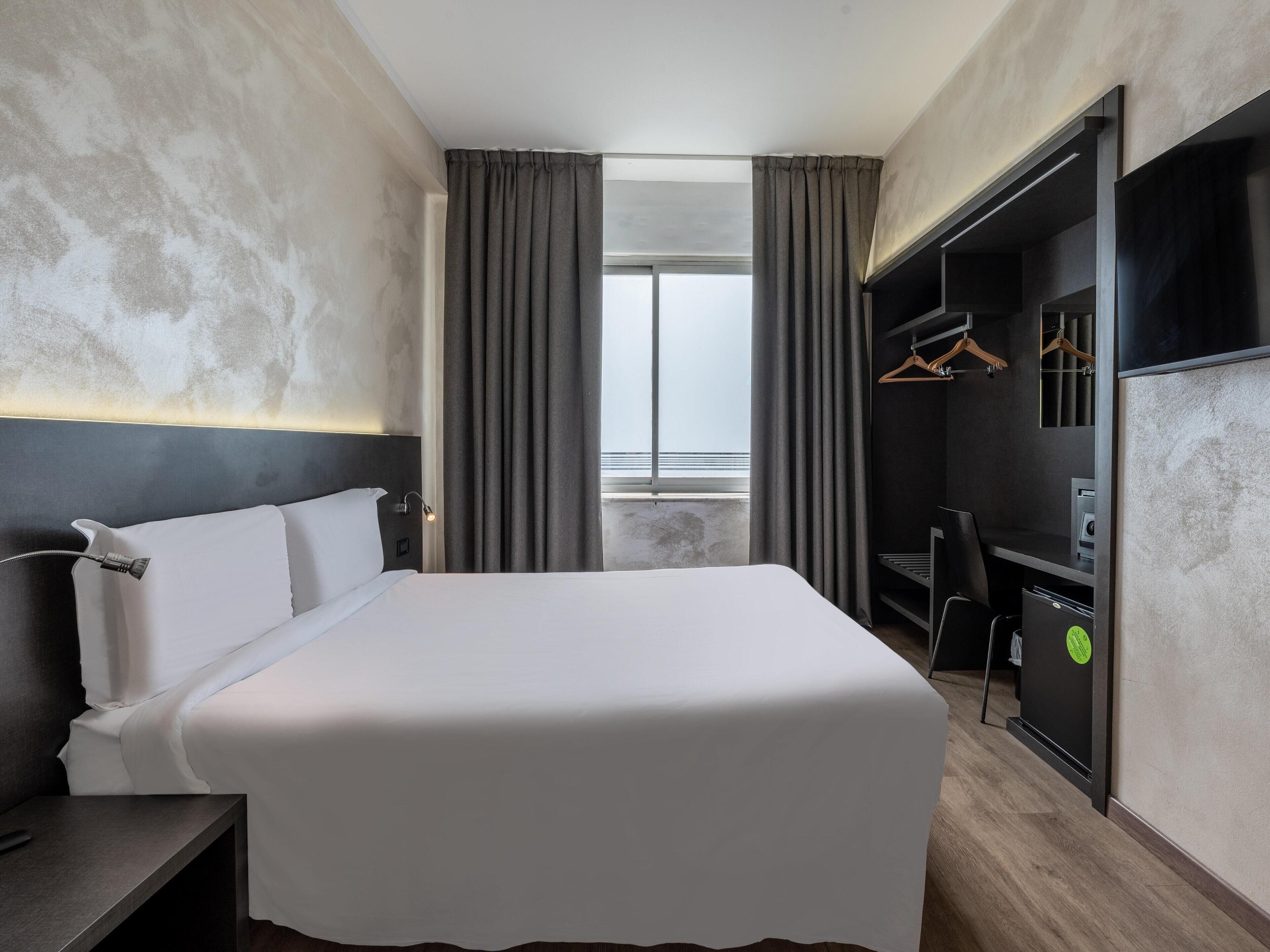 Habitación doble estándar | 1 habitación, ropa de cama de alta calidad y minibar 