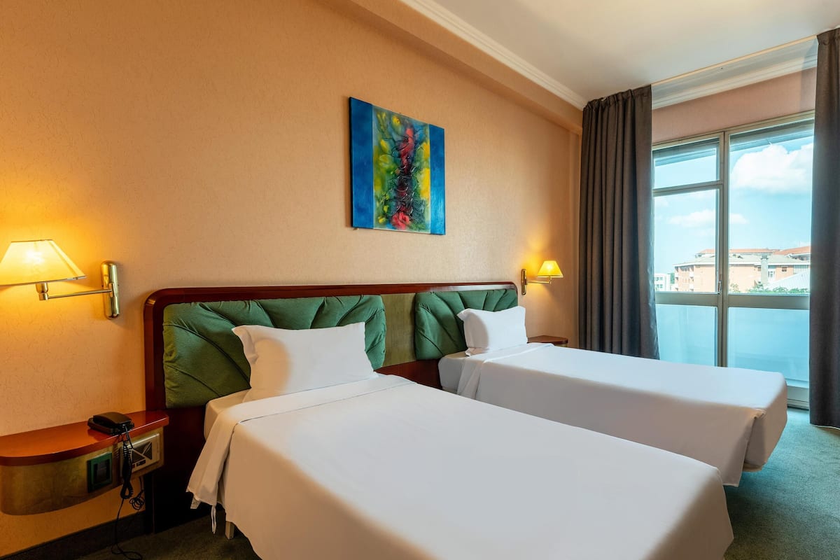 Standard Twin Room | 1 bedroom, premium bedding, minibar, in-room safe
