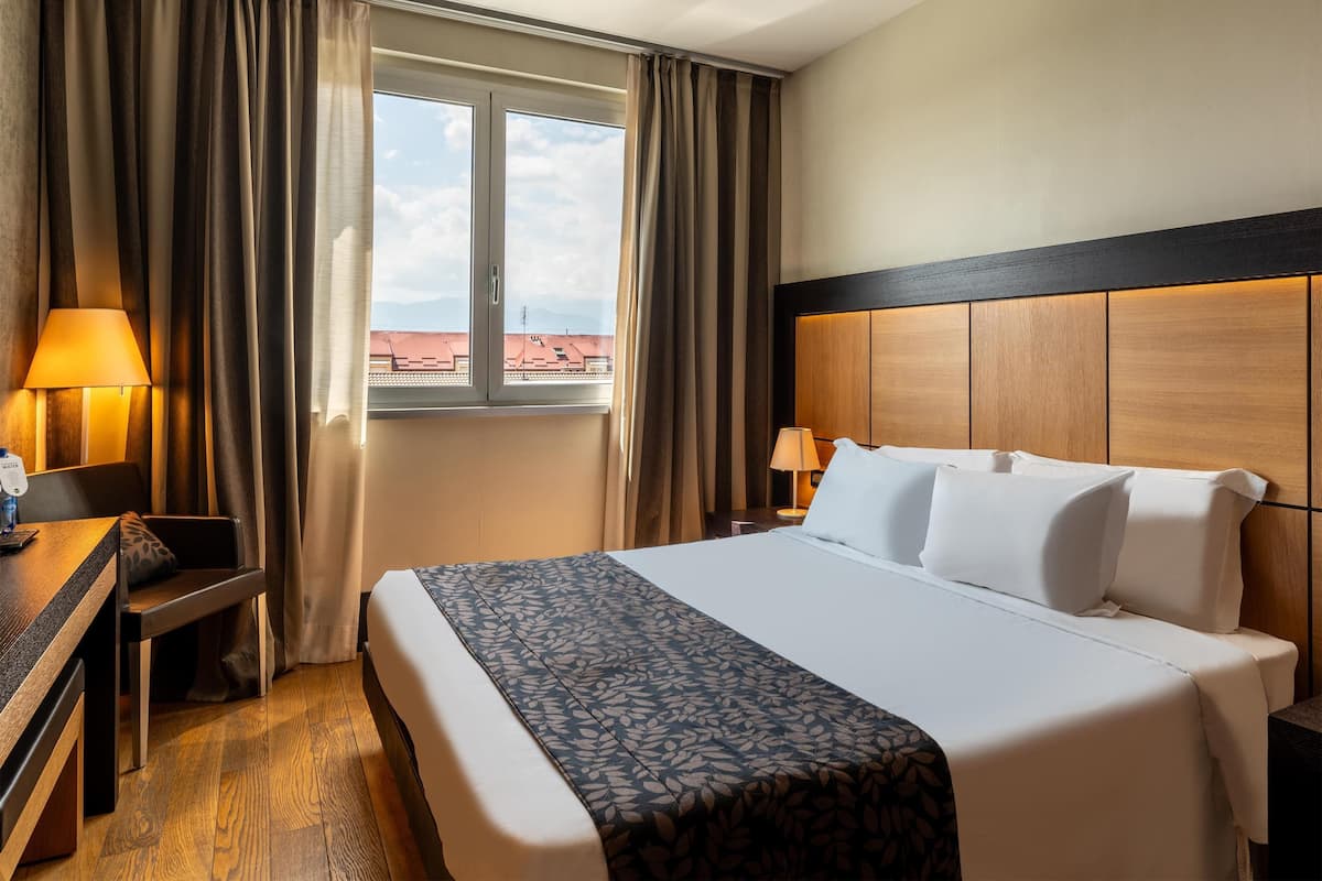 Suite superior | 1 habitación, ropa de cama de alta calidad y minibar