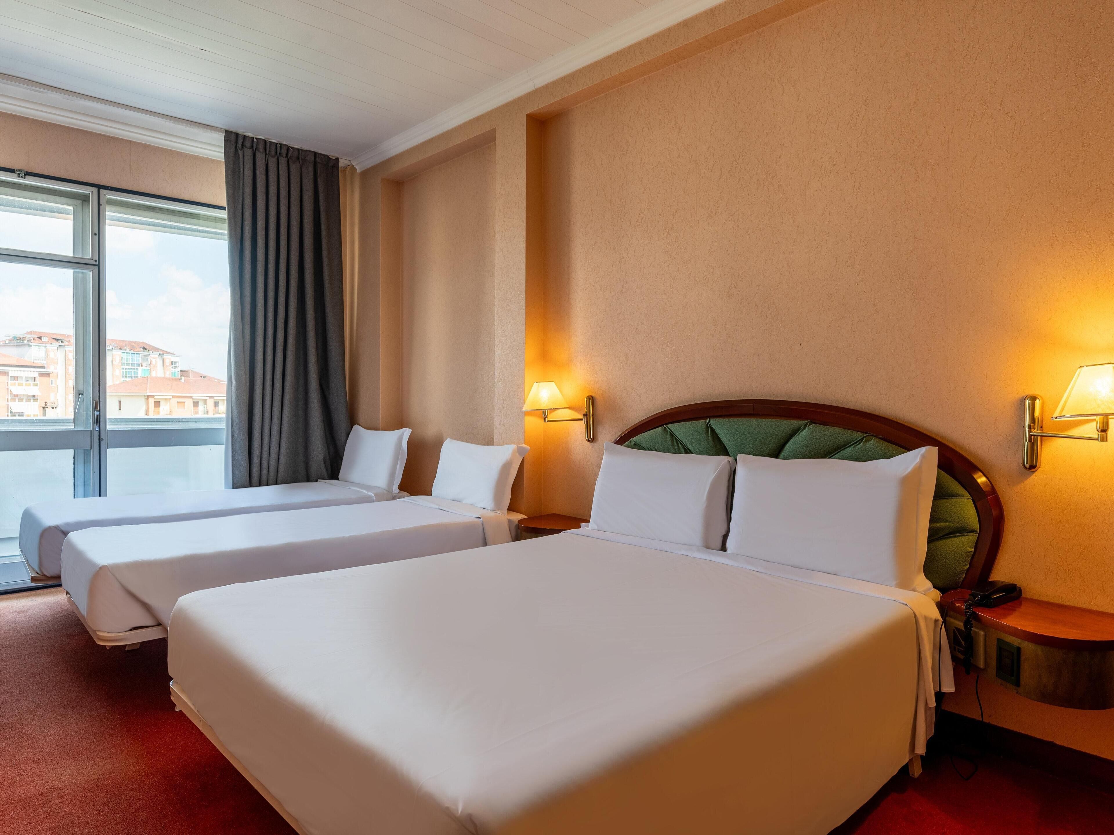 Standard Quadruple Room | 1 bedroom, premium bedding, minibar, in-room safe