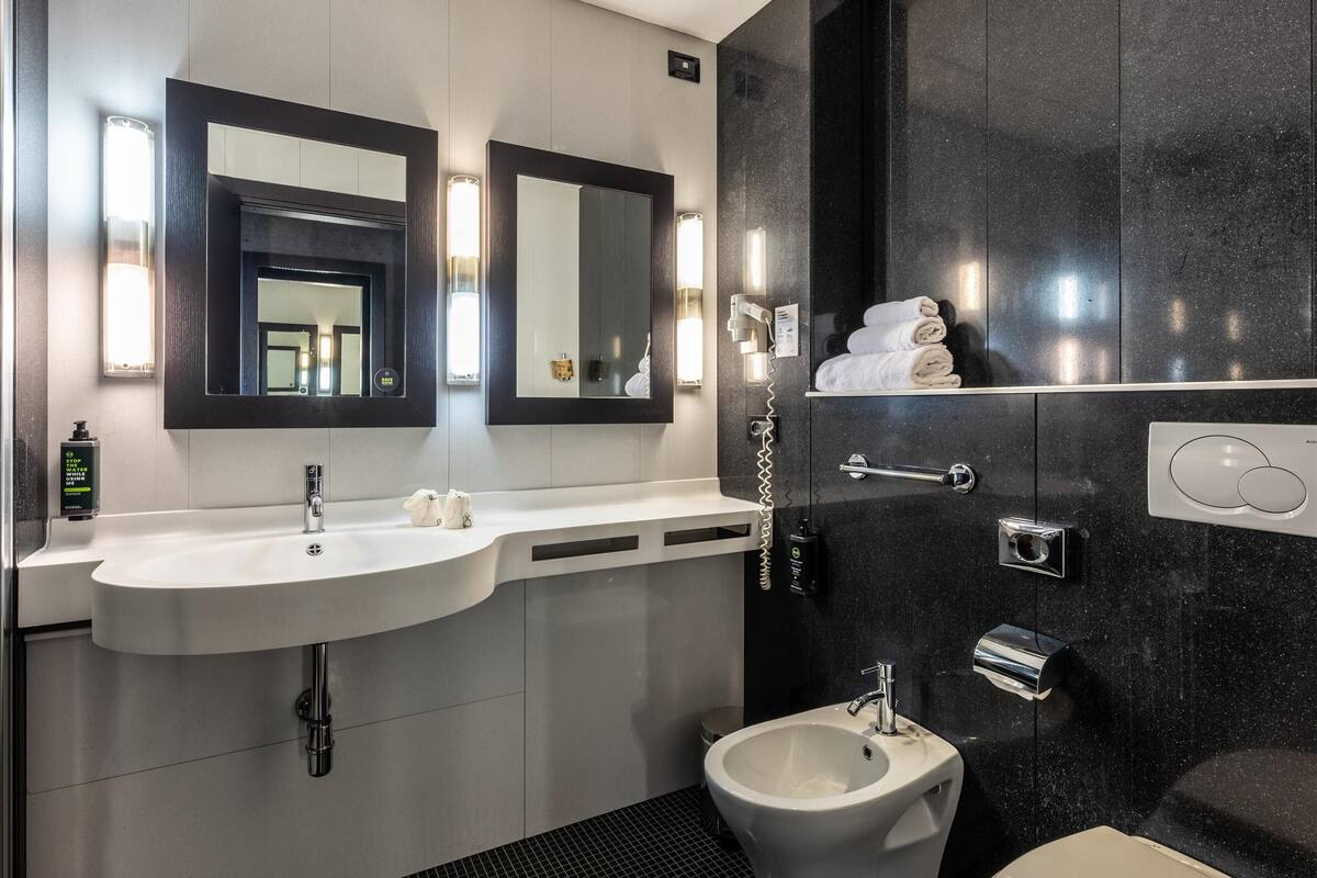 superior suite | bathroom | rainfall showerhead, free toiletries, hair dryer, bidet