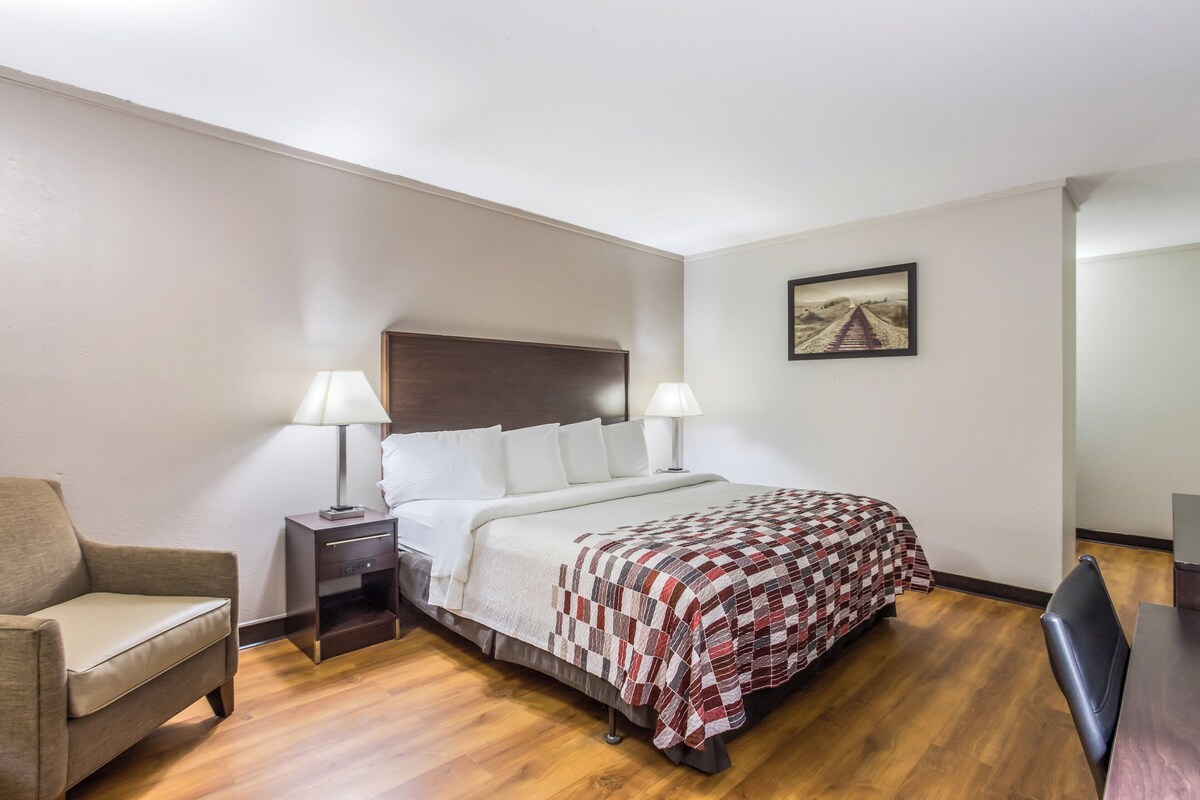 Desk, iron/ironing board, cribs (free), WiFi (free)