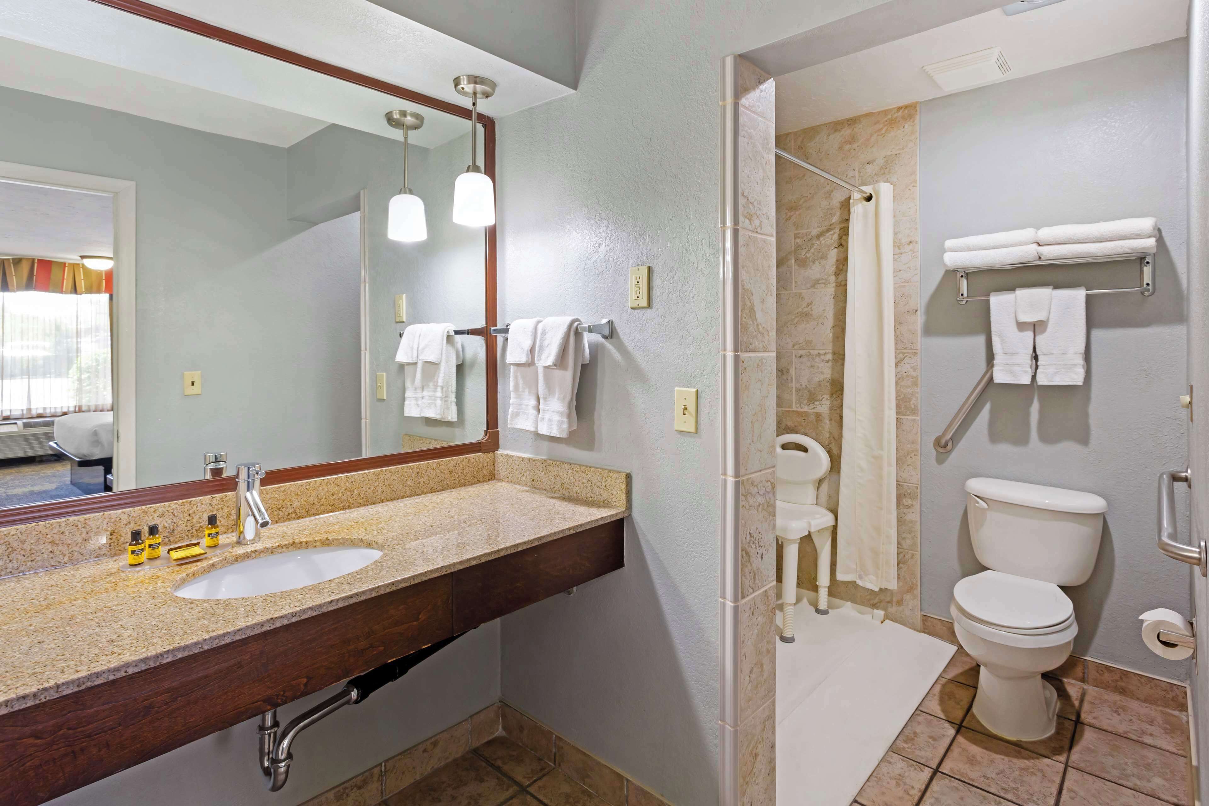 standard room, 2 queen beds, accessible, refrigerator & microwave | bathroom | combined shower/bathtub, free toiletries, hair dryer, towels