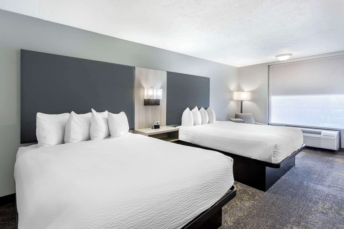 desk, laptop workspace, blackout curtains, iron/ironing board