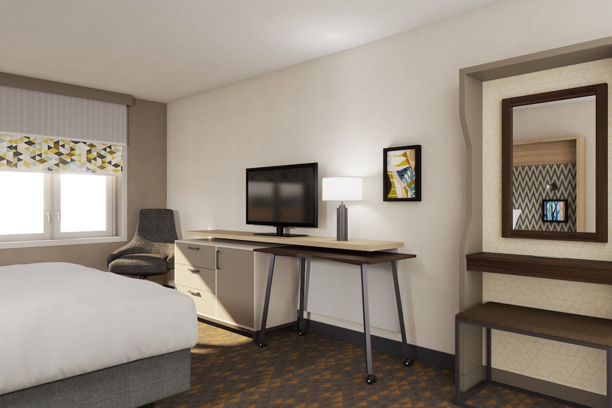 Desk, laptop workspace, blackout drapes, iron/ironing board