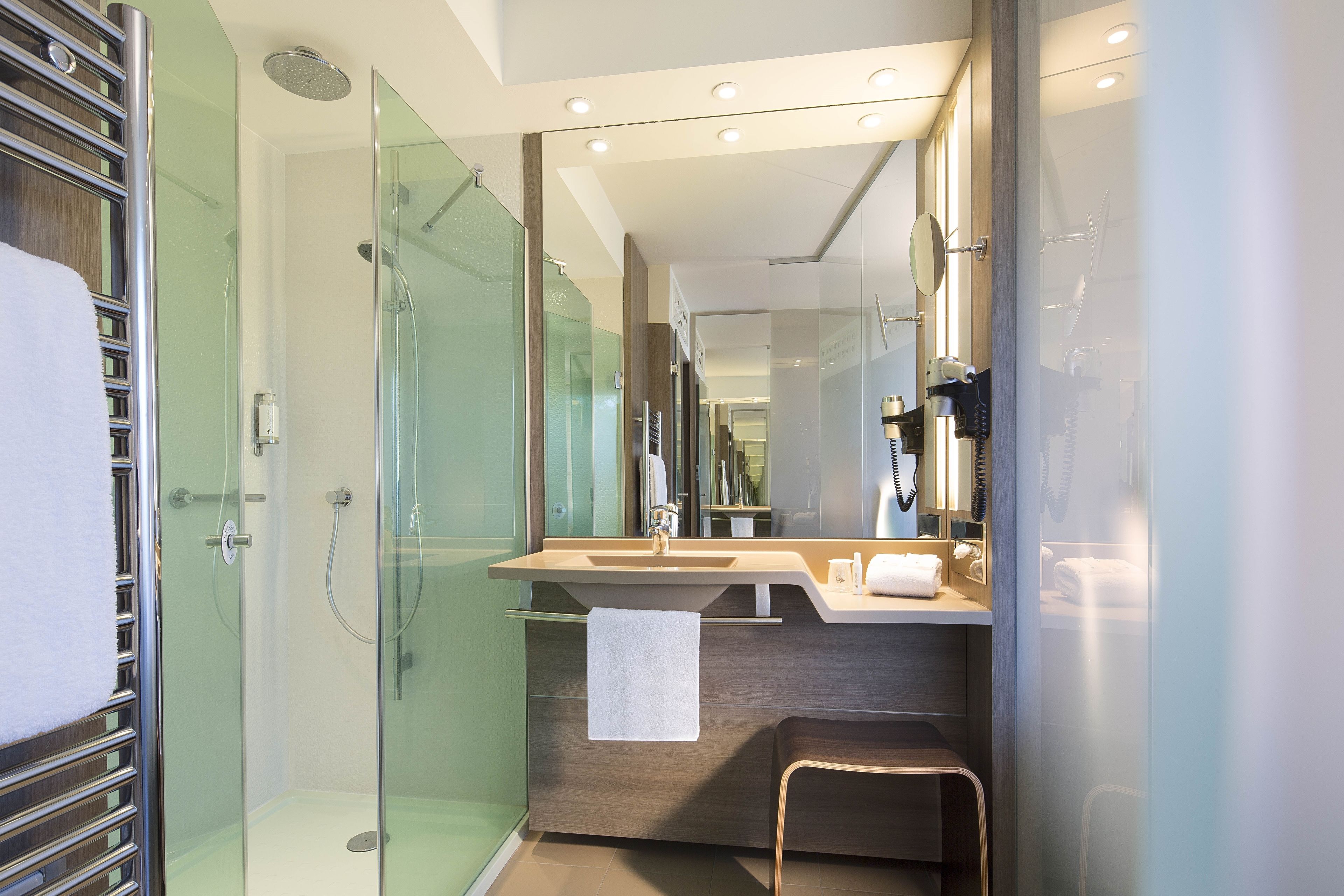 shower, free toiletries, hair dryer, towels