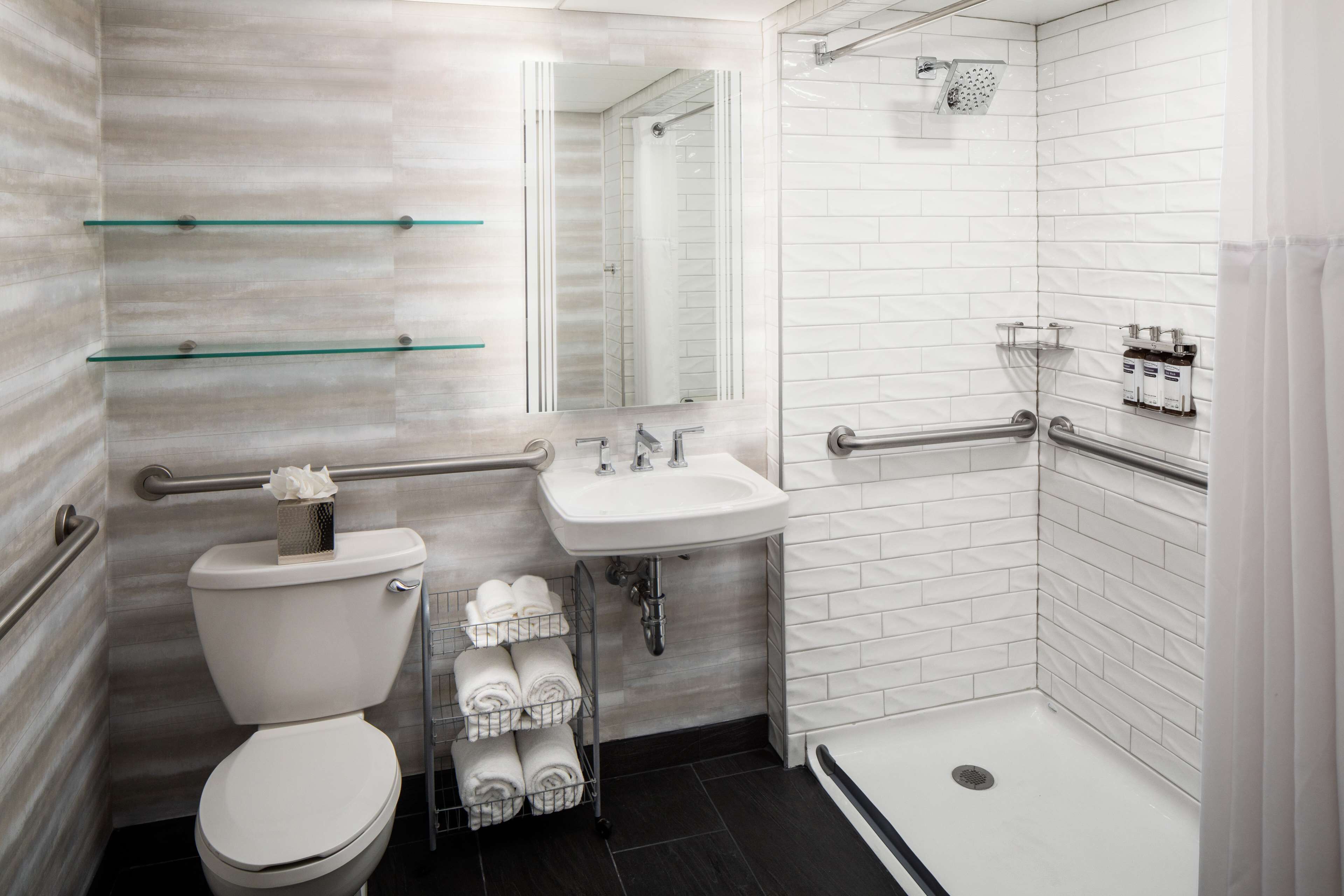 hydromassage showerhead, eco-friendly toiletries, hair dryer, towels