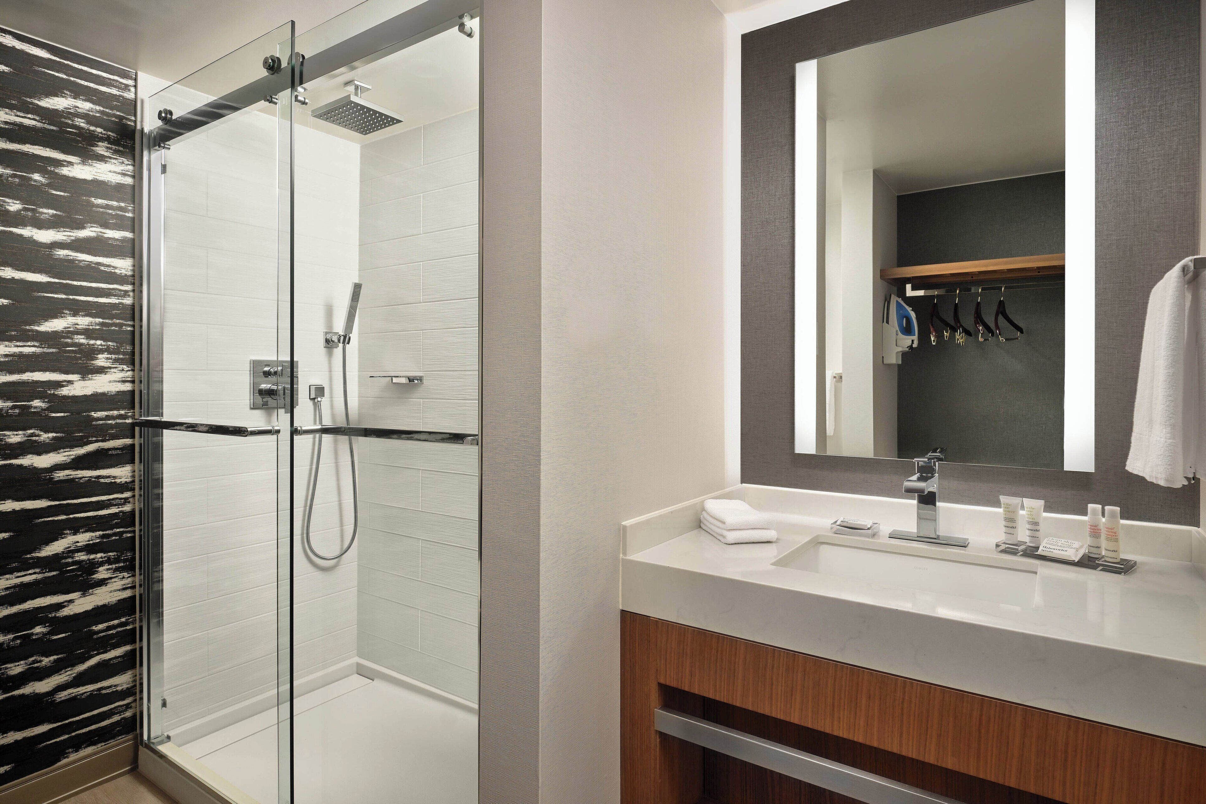 eco-friendly toiletries, hair dryer, towels