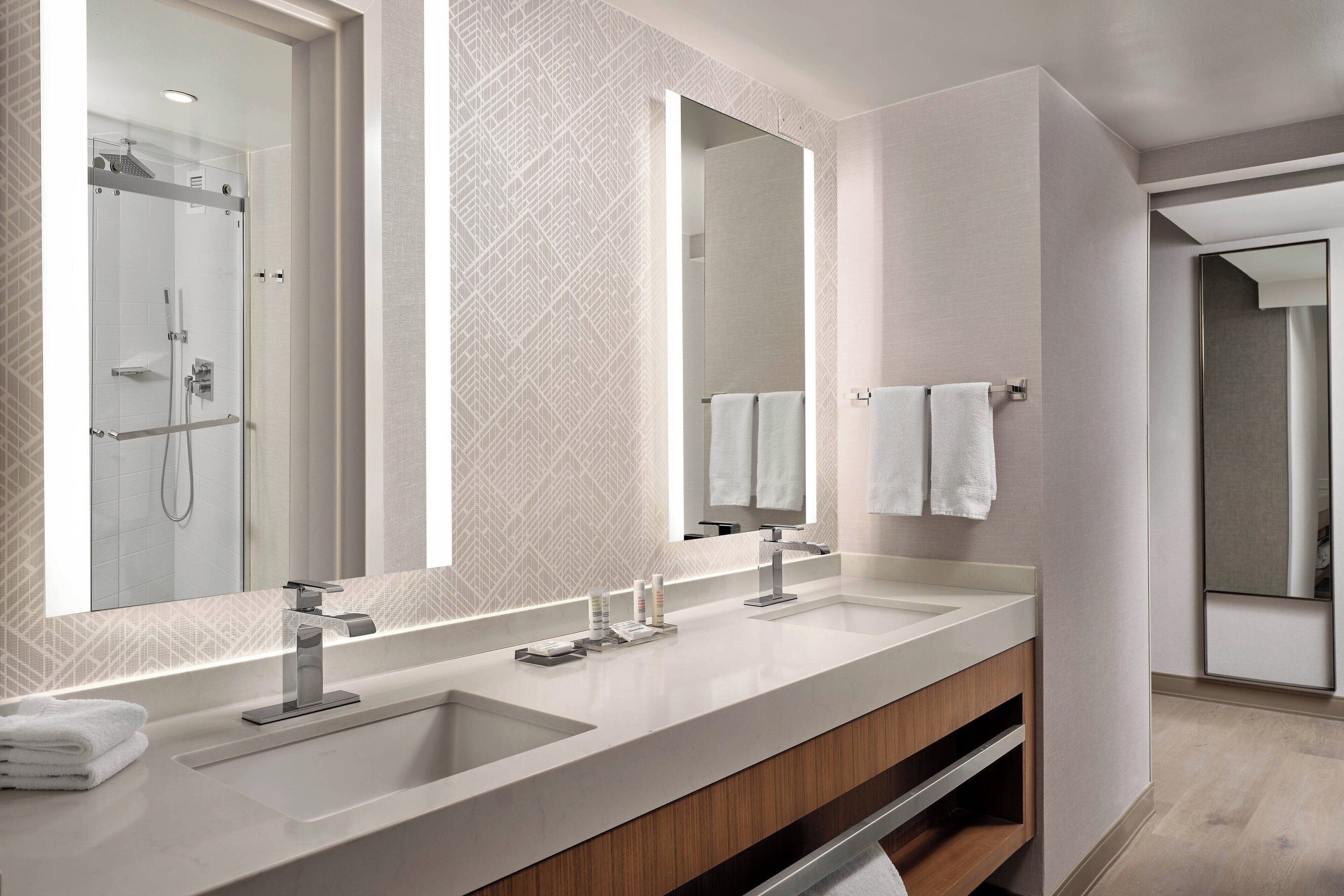 eco-friendly toiletries, hair dryer, towels