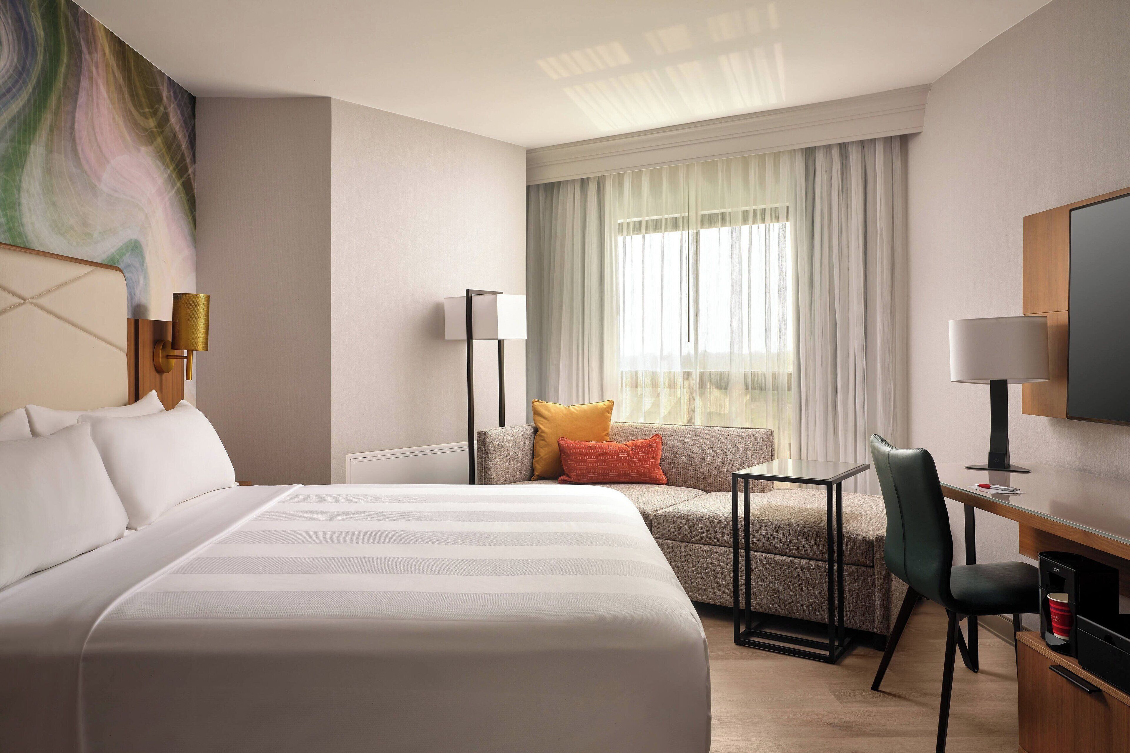 Room, 1 King Bed with Sofa bed | In-room safe, individually furnished, desk, blackout drapes