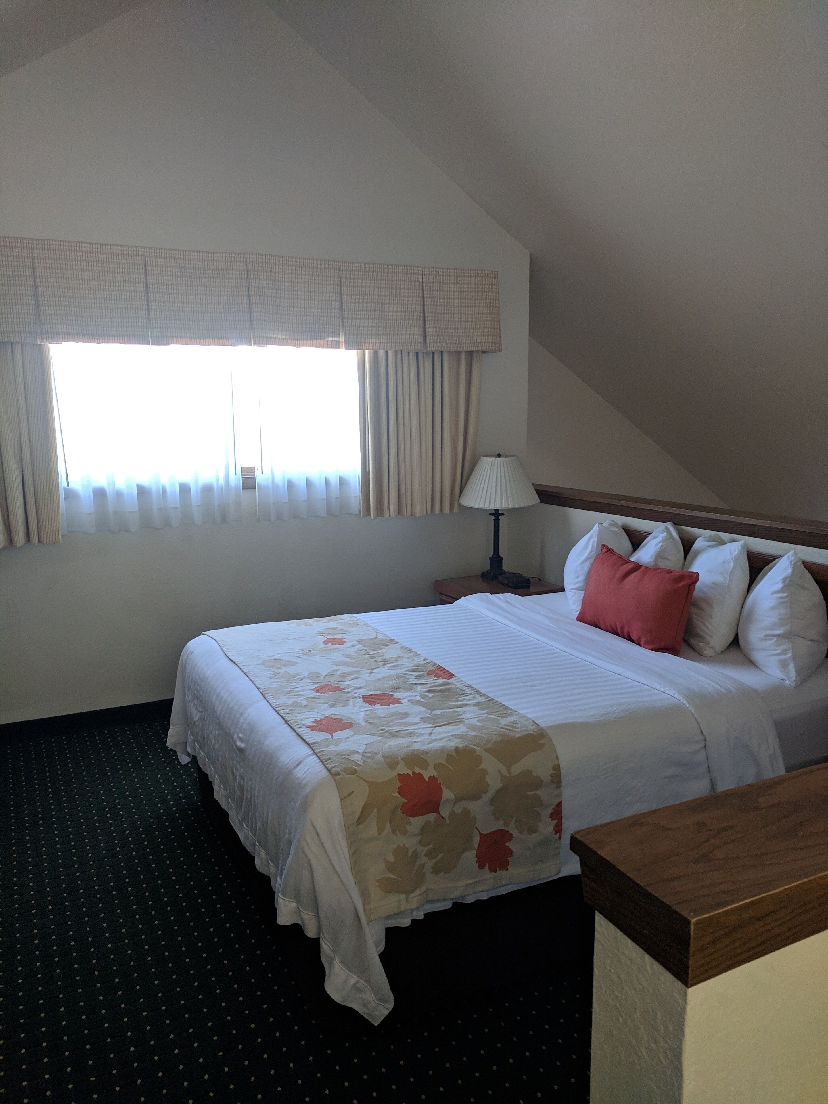 desk, laptop workspace, blackout curtains, iron/ironing board