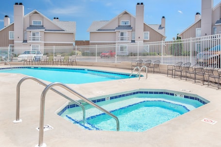 Seasonal outdoor pool. Hawthorn Extended Stay by Wyndham Green Bay