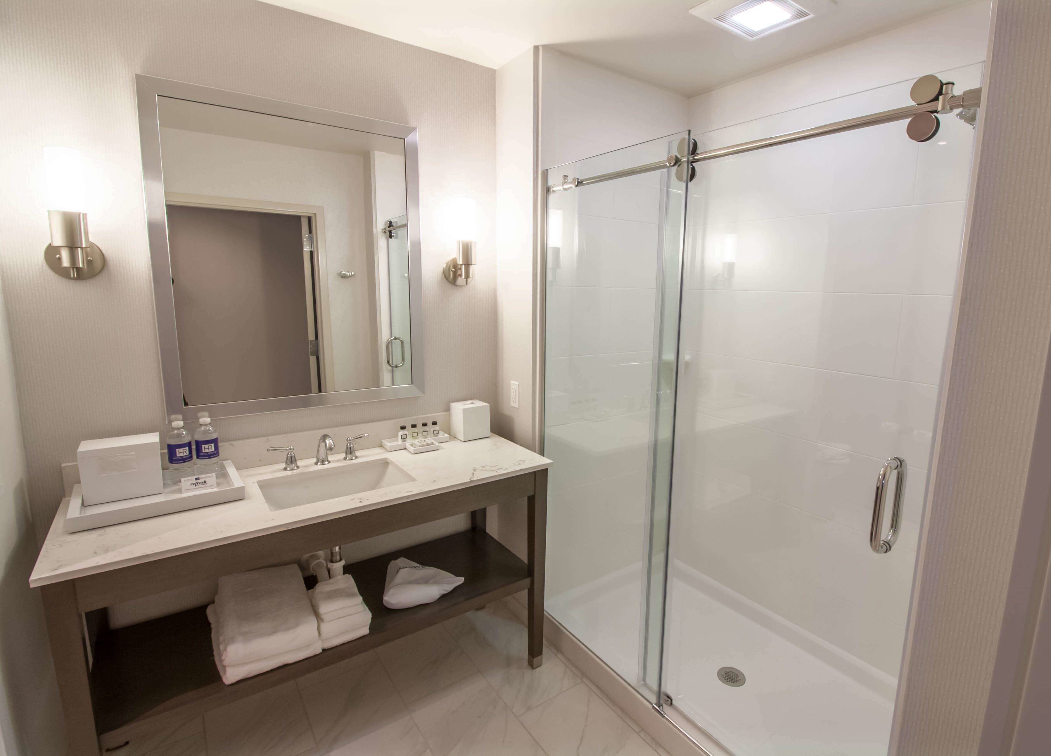 shower, designer toiletries, hair dryer, bathrobes