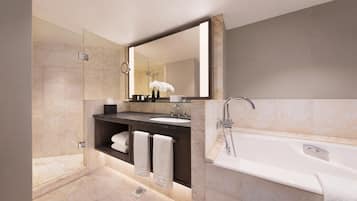 A modern bathroom with a glass-enclosed shower, a large mirror, a bathtub, and a vanity with a sink and towel rack.