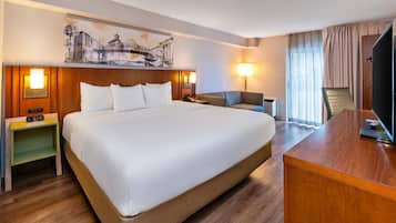 Room, 1 King Bed, Non Smoking, Ground Floor Pet-Friendly | Pillowtop beds, desk, laptop workspace, blackout drapes