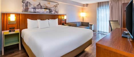 Room, 1 King Bed, Non Smoking, Ground Floor Pet-Friendly | Pillowtop beds, desk, laptop workspace, blackout drapes