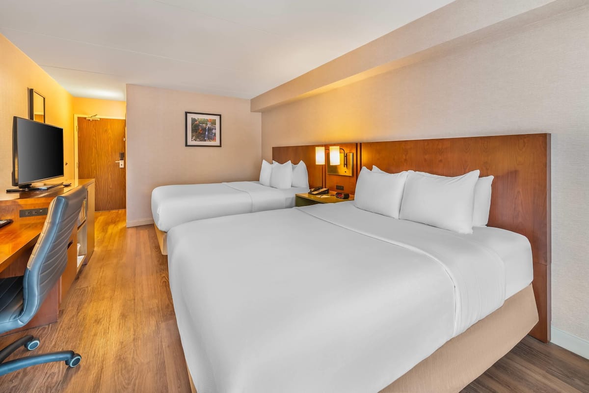 Room, 2 Queen Beds, Non Smoking, Ground Floor Pet-Friendly | Pillowtop beds, desk, laptop workspace, blackout drapes