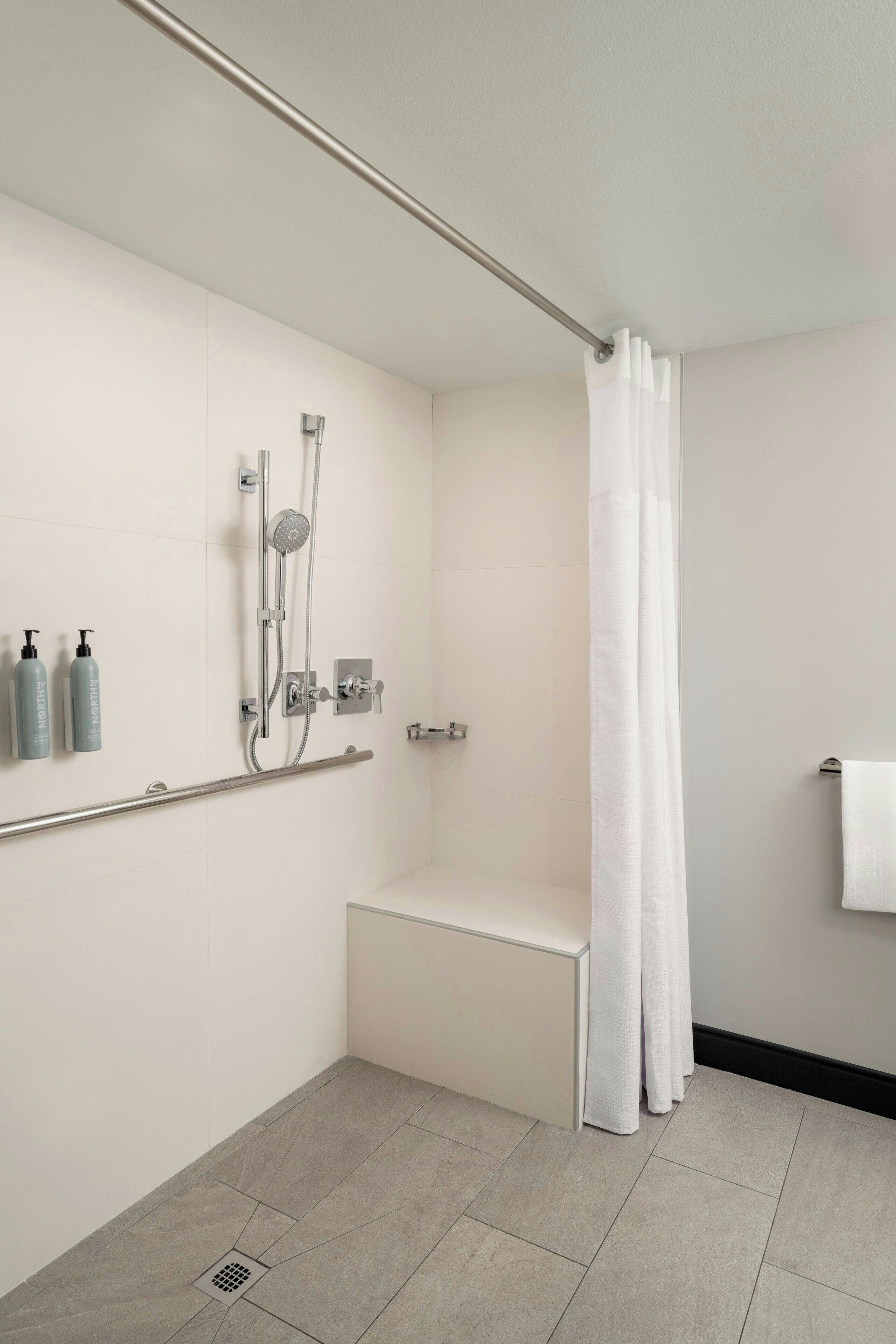 eco-friendly toiletries, hair dryer, bathrobes, towels