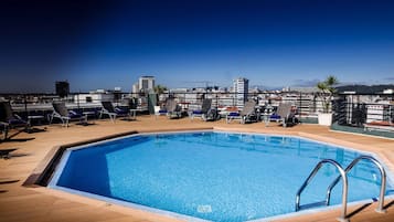 Seasonal outdoor pool, open 9:00 AM to 9:00 PM, sun loungers