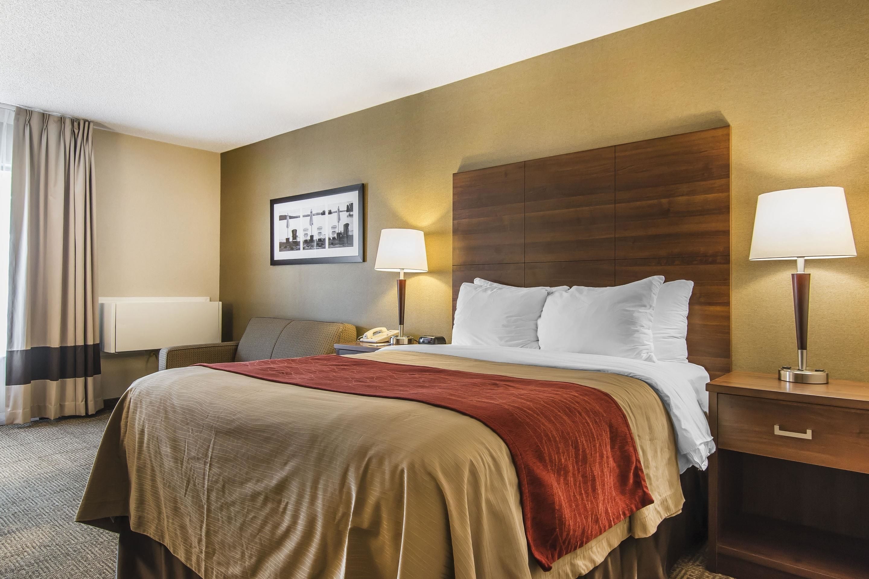 premium bedding, pillow-top beds, desk, laptop workspace