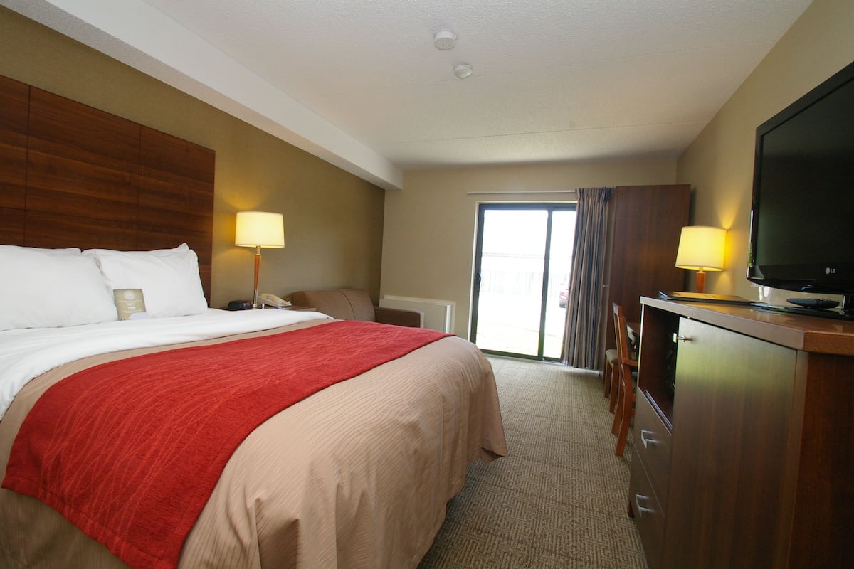Premium bedding, pillow-top beds, desk, laptop workspace