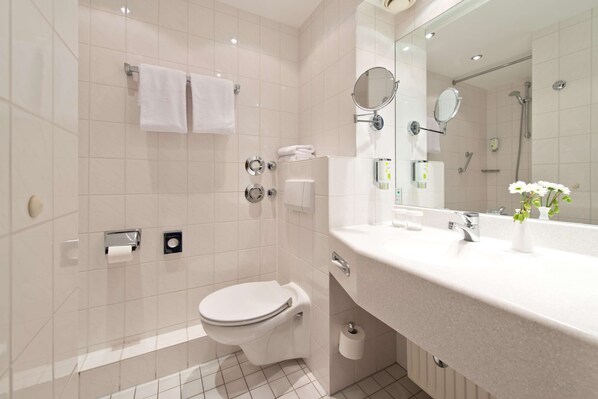 Shower, eco-friendly toiletries, hair dryer, towels