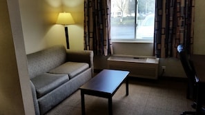 Suite, 1 King Bed with Sofa bed | In-room safe, desk, blackout curtains, iron/ironing board