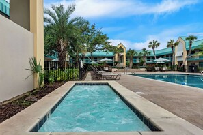Outdoor pool, open 10:00 AM to 10:00 PM, pool umbrellas, sun loungers