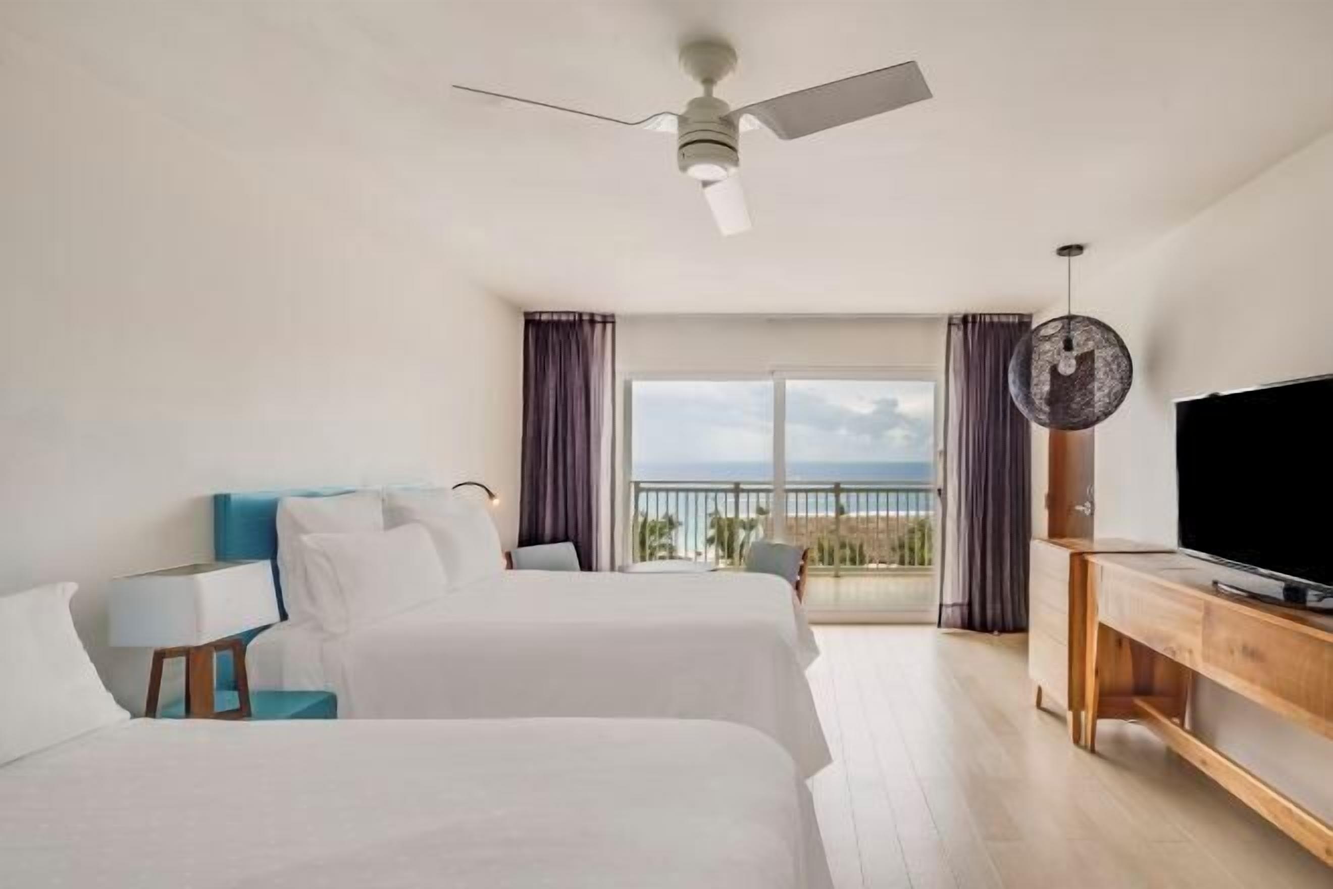 Premium bedding, down comforters, pillowtop beds, free minibar