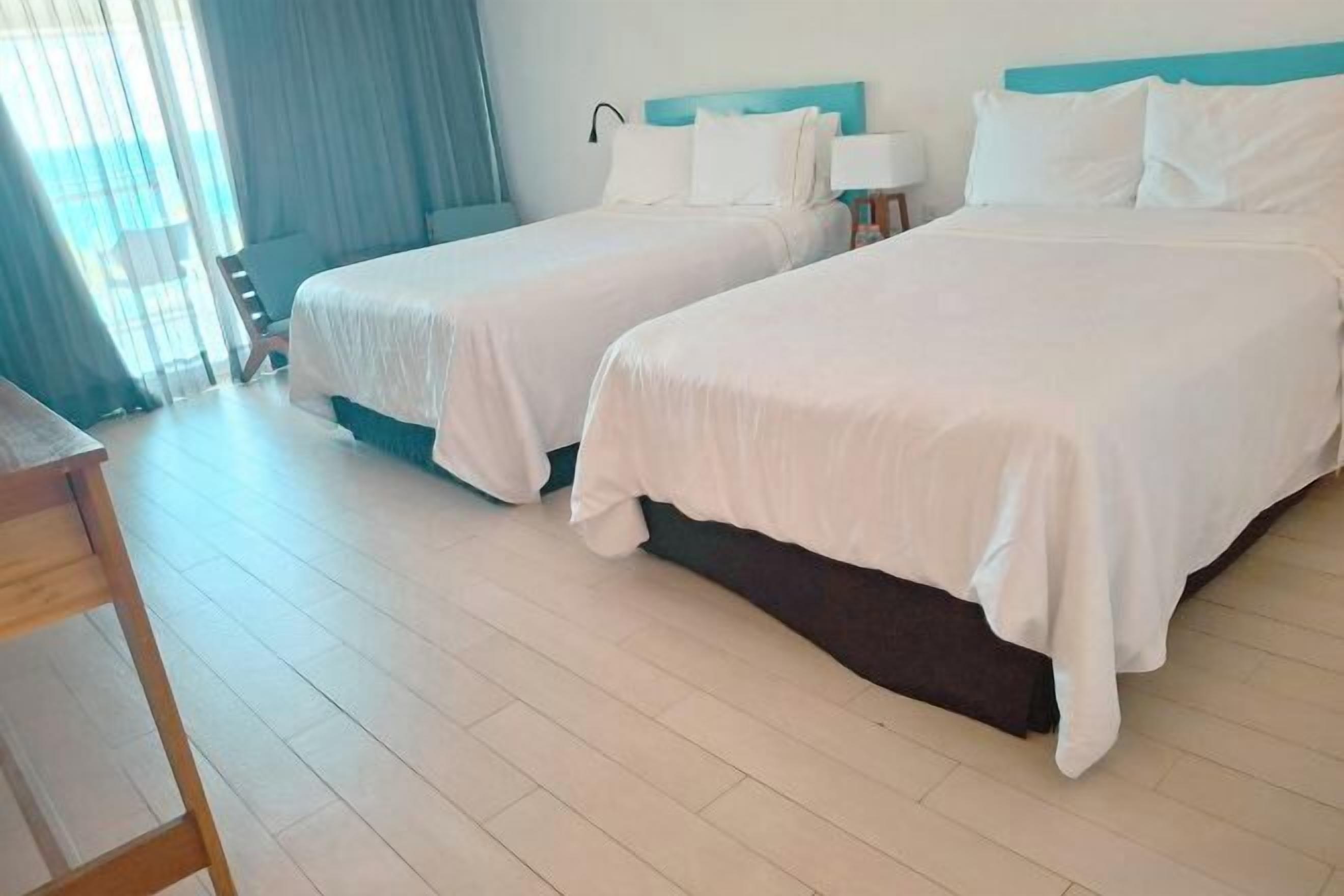 Premium bedding, down comforters, pillowtop beds, free minibar