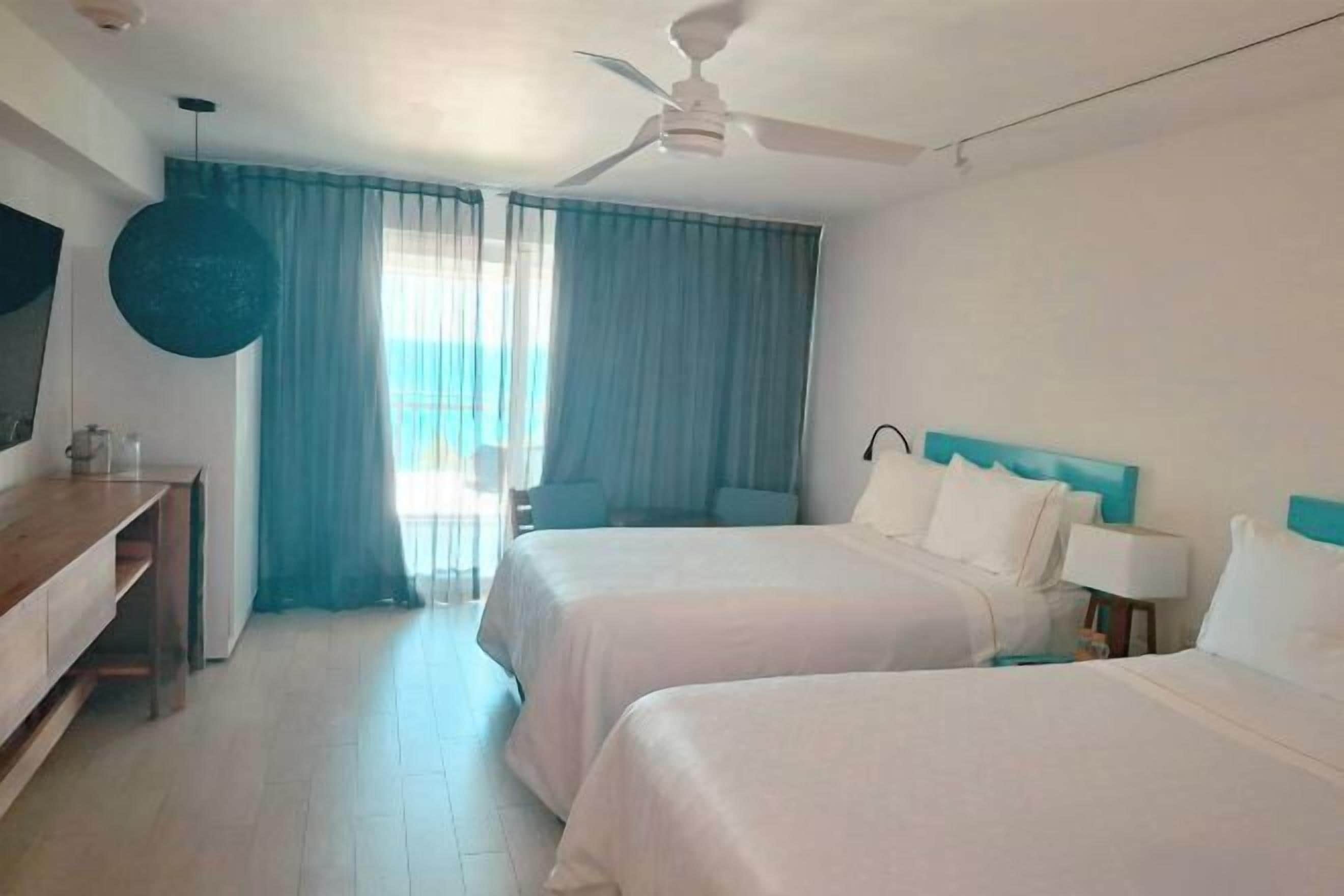 Premium bedding, down comforters, pillowtop beds, free minibar