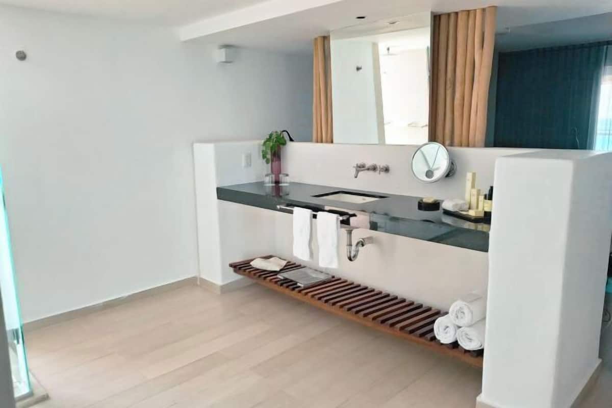Shower, rainfall showerhead, eco-friendly toiletries, hair dryer