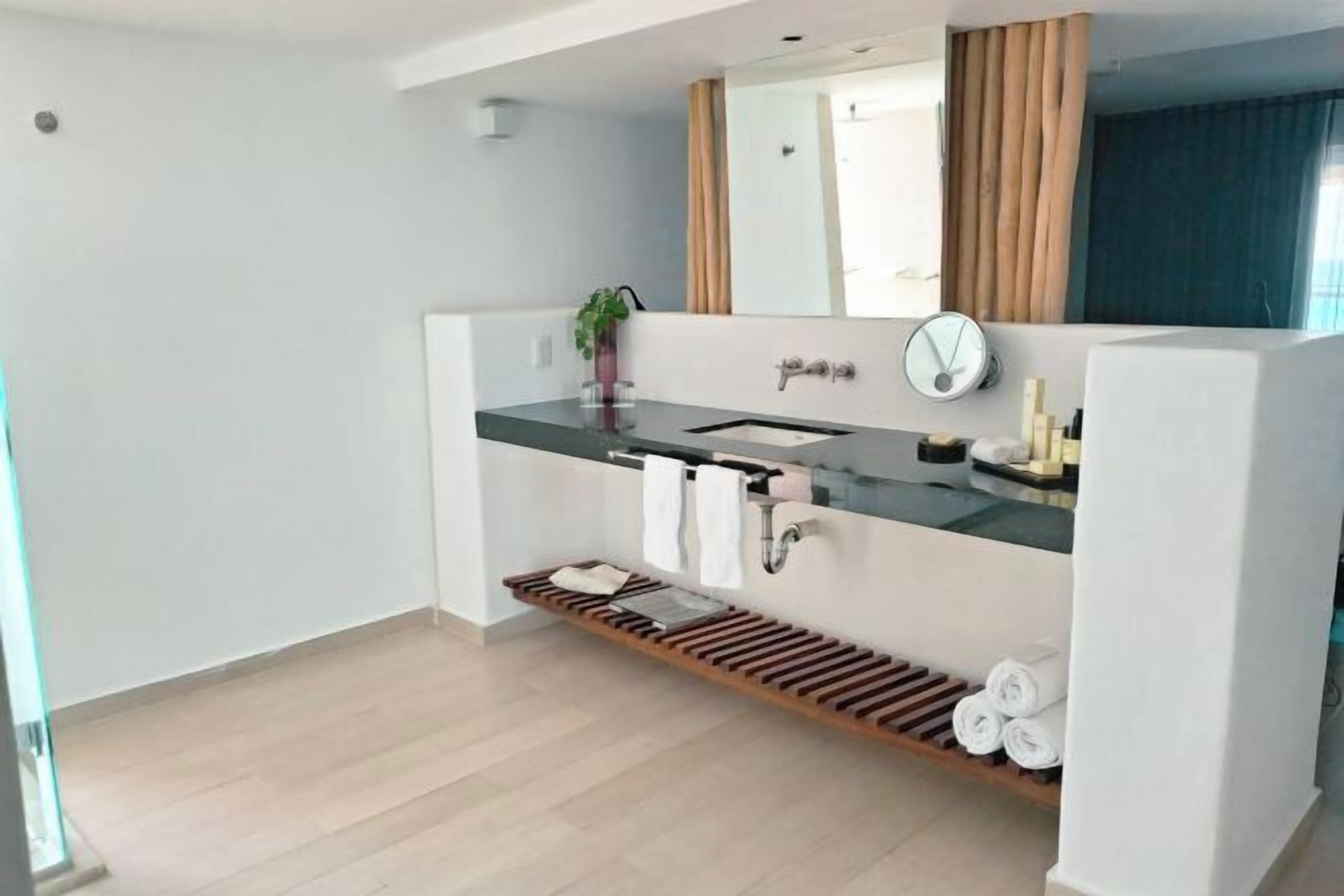 Shower, rainfall showerhead, eco-friendly toiletries, hair dryer