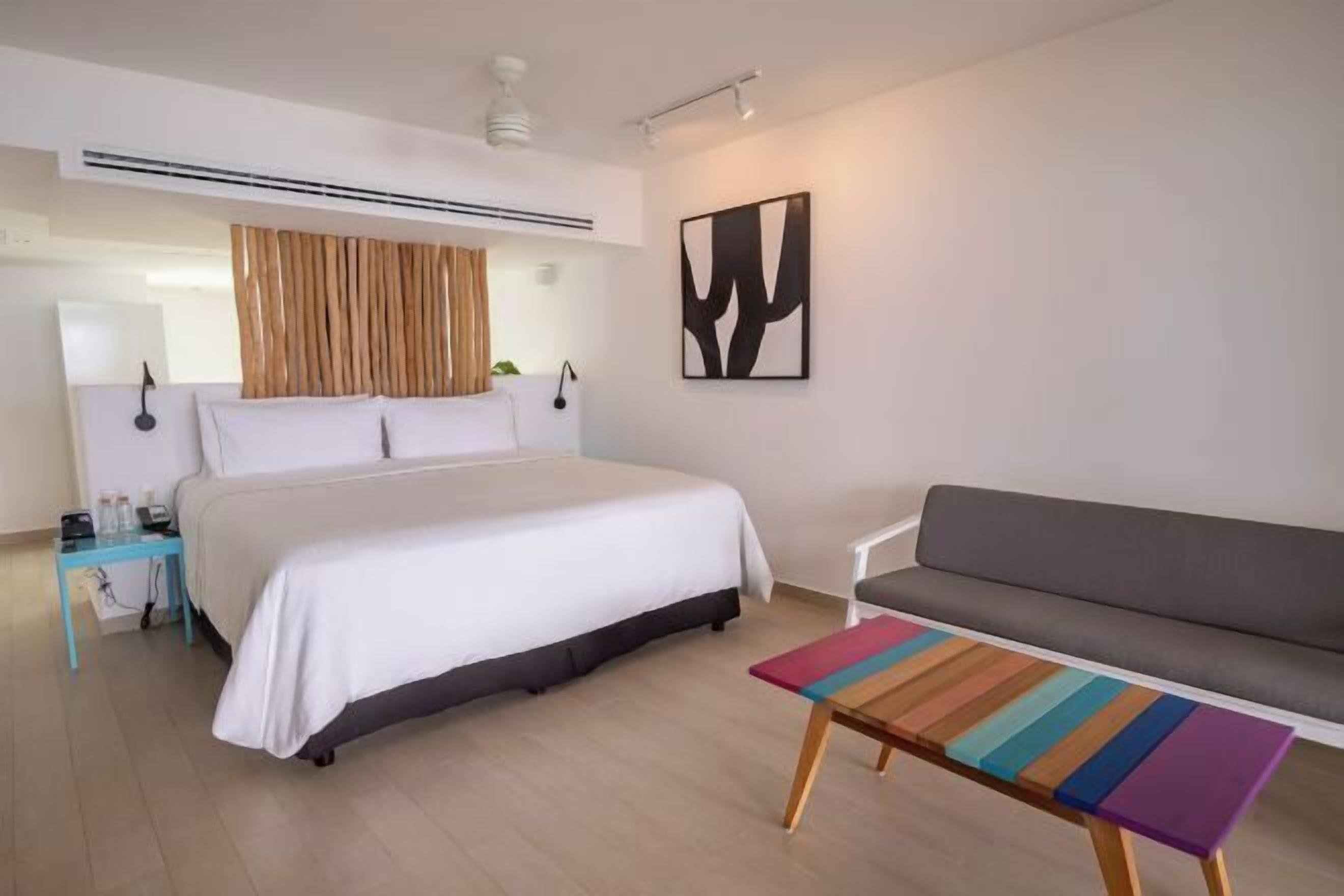 Premium bedding, down comforters, pillowtop beds, free minibar