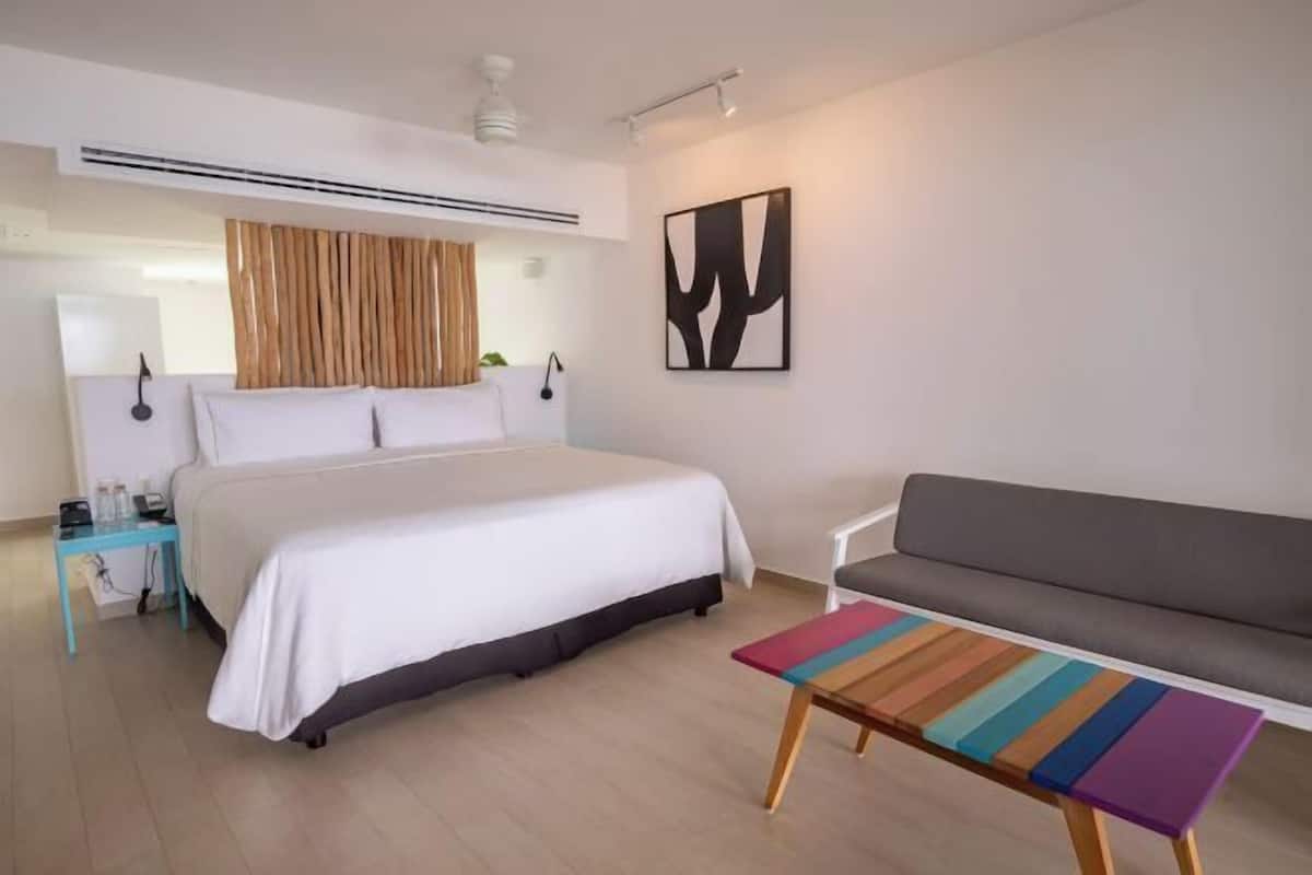 Premium bedding, down duvets, pillow-top beds, free minibar