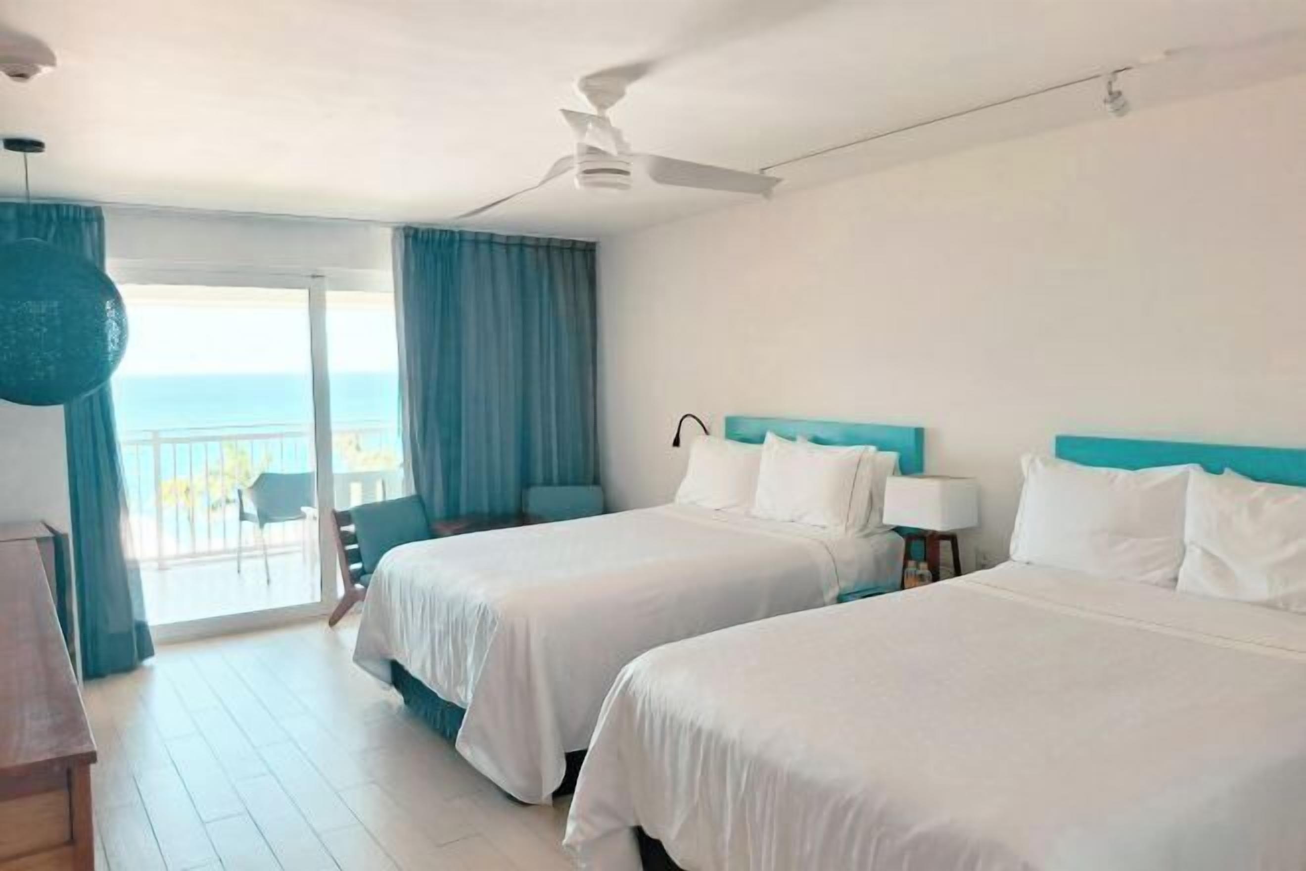Premium bedding, down comforters, pillowtop beds, free minibar