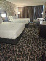 Down comforters, pillowtop beds, in-room safe, desk