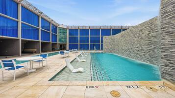 Seasonal outdoor pool, cabanas (surcharge), pool umbrellas