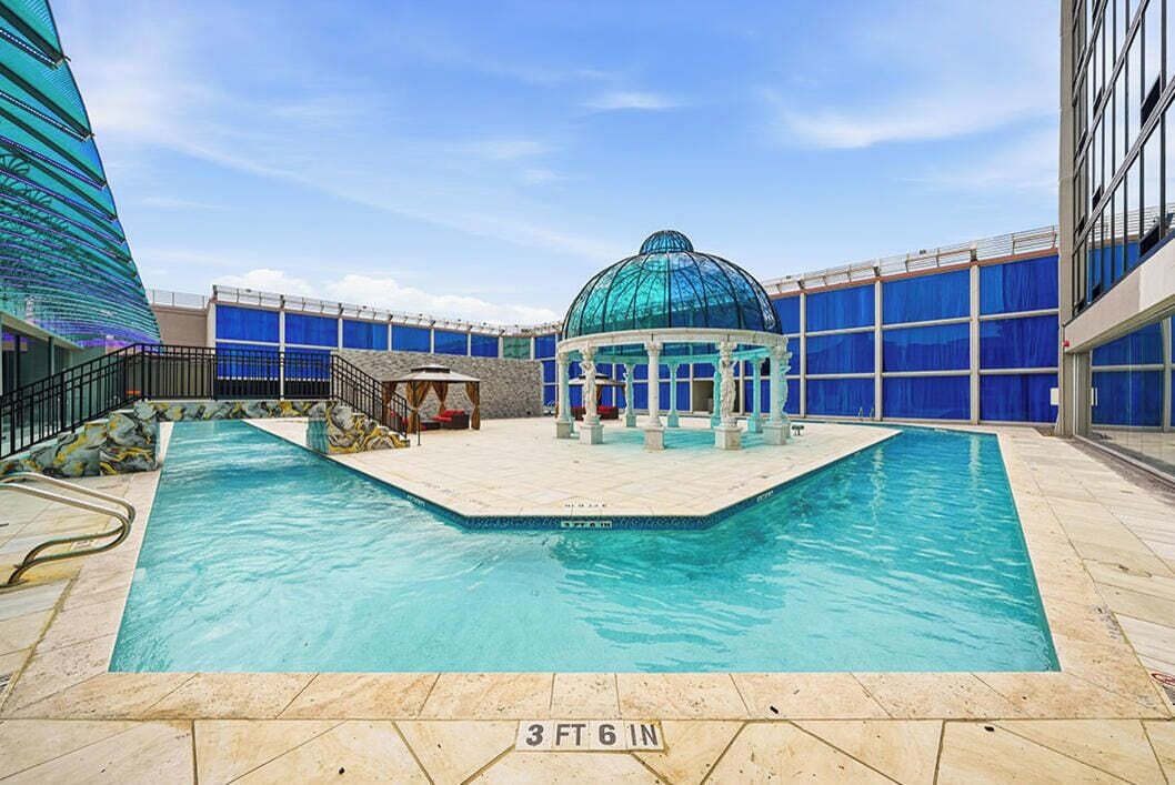 Down comforters, pillowtop beds, in-room safe, desk