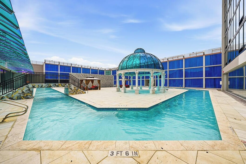 Down comforters, pillowtop beds, in-room safe, desk