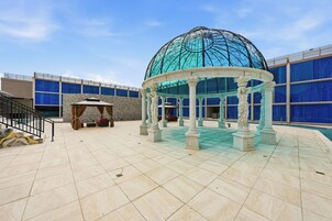 Seasonal outdoor pool, cabanas (surcharge), pool umbrellas