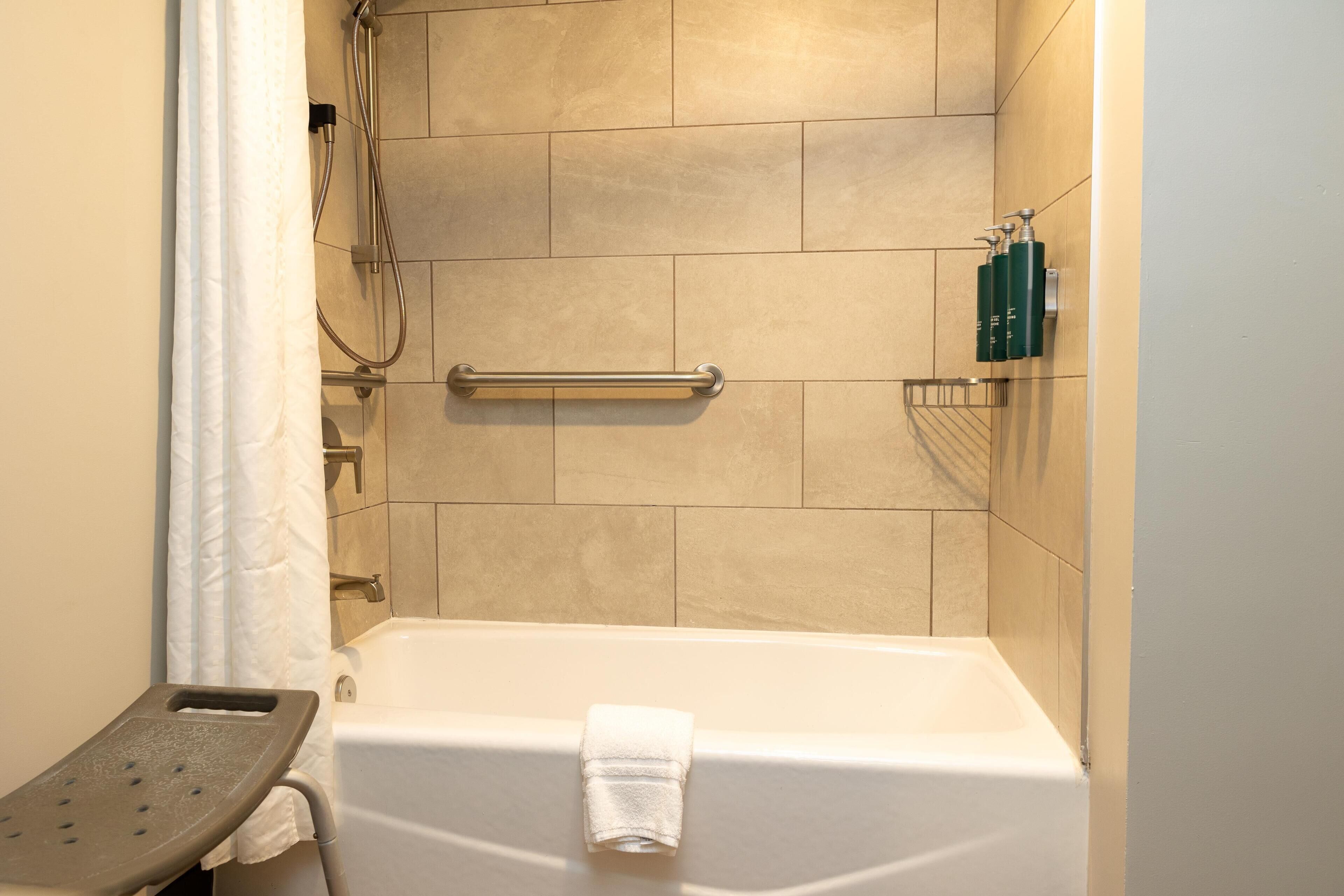 Room, 1 King Bed, Accessible, Bathtub (Mobility & Hearing) | Bathroom | Combined shower/bathtub, eco-friendly toiletries, hair dryer, towels