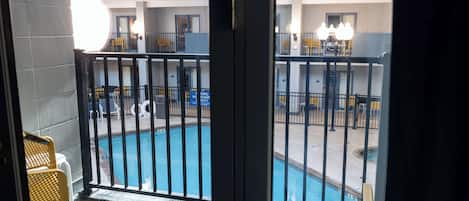 Room, 2 Queen Beds, Pool View | Hypo-allergenic bedding, in-room safe, desk, blackout drapes